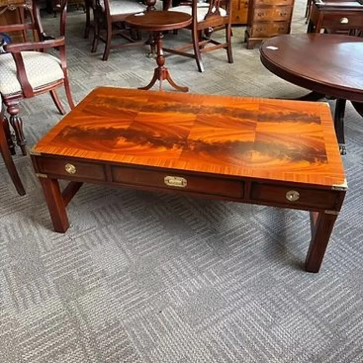 Handsome coffee table in a military campaign style