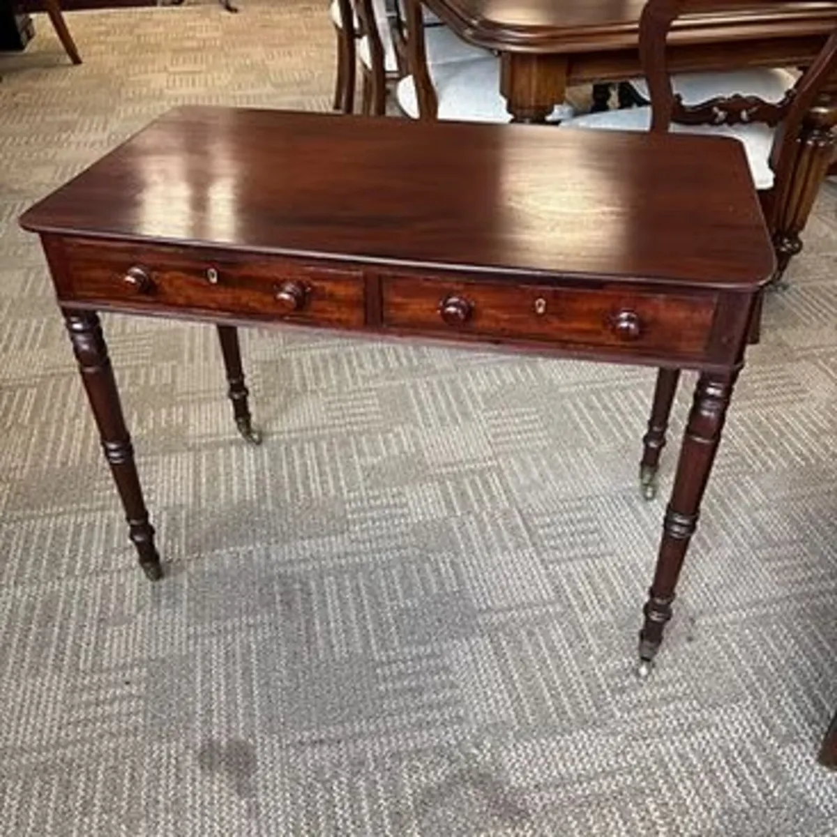Classic antique William IV mahogany writing table.
