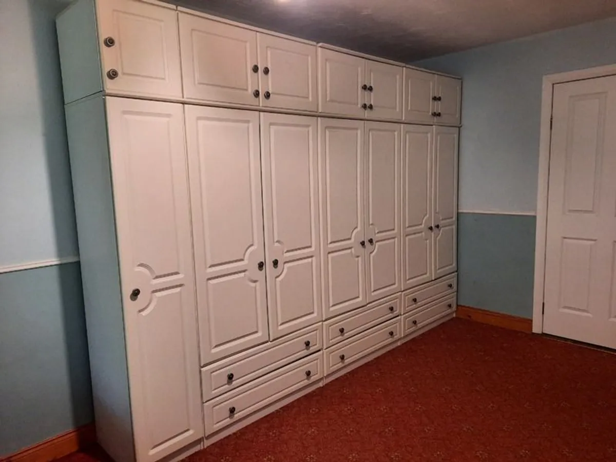 Large fitted bedroom wardrobe set with matching chest of drawers - Image 4