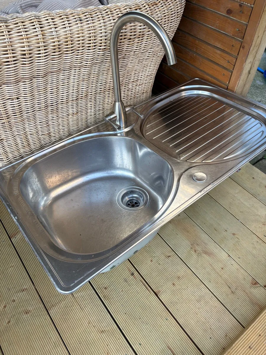 Kitchen sink with tap - Image 1
