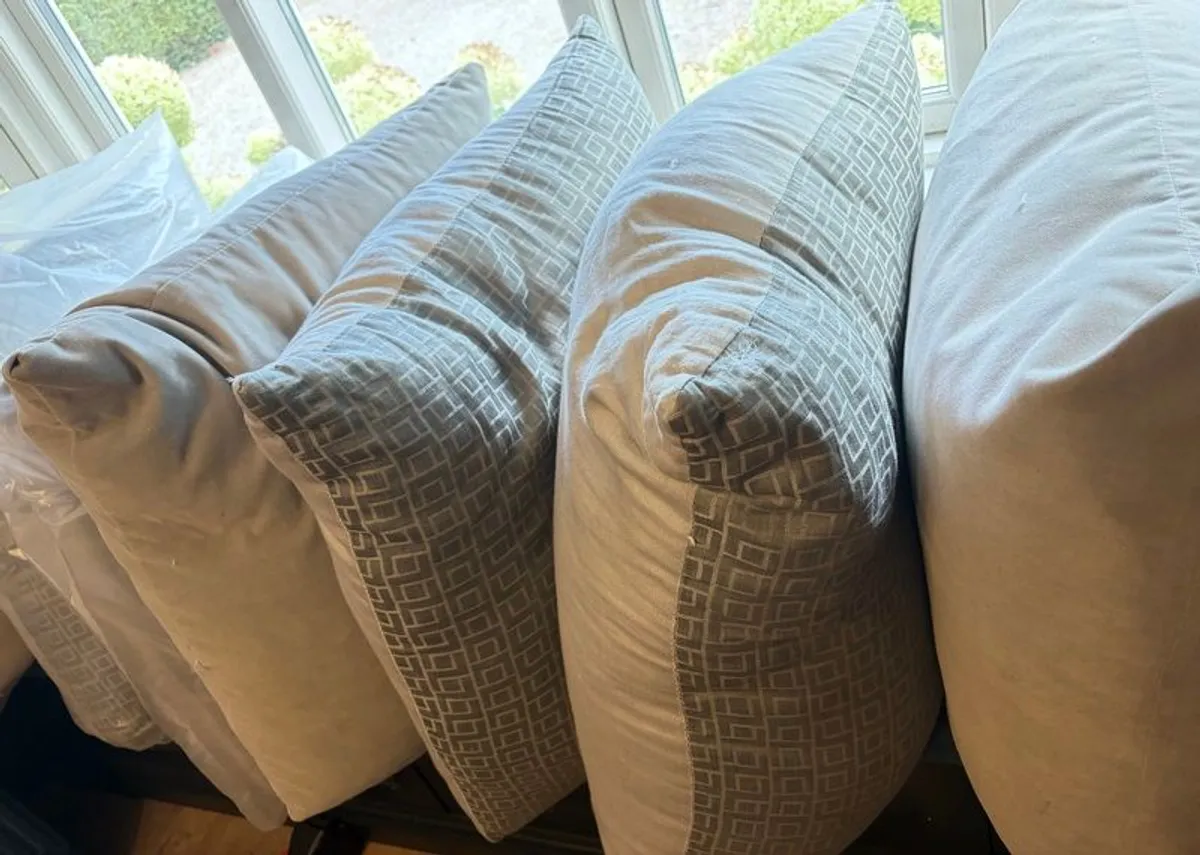 8 large Feather Filled Cushions