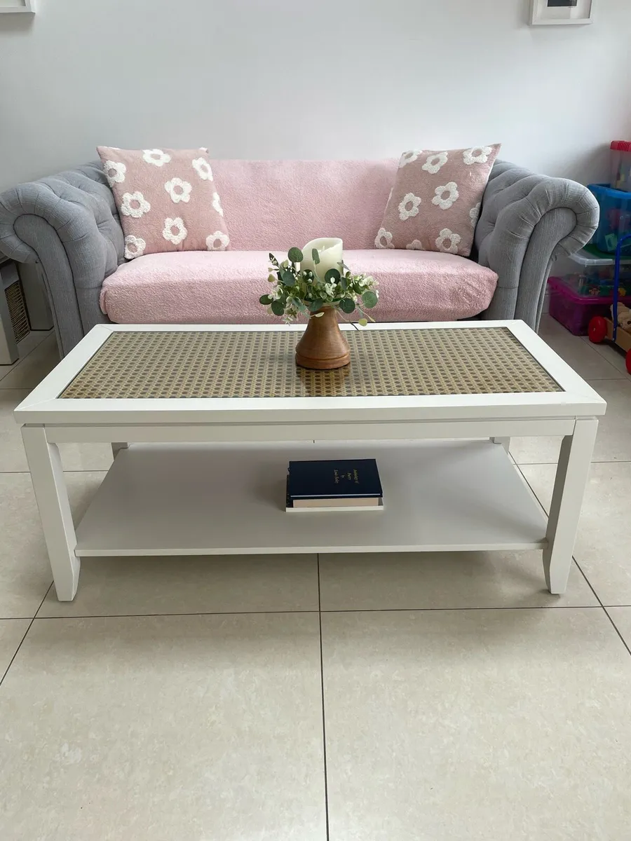 Glass topped coffee table with cane effect top - Image 1