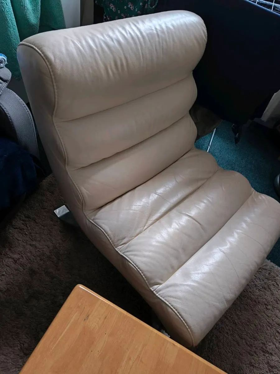 Cream leather armchair with solid base - Image 1