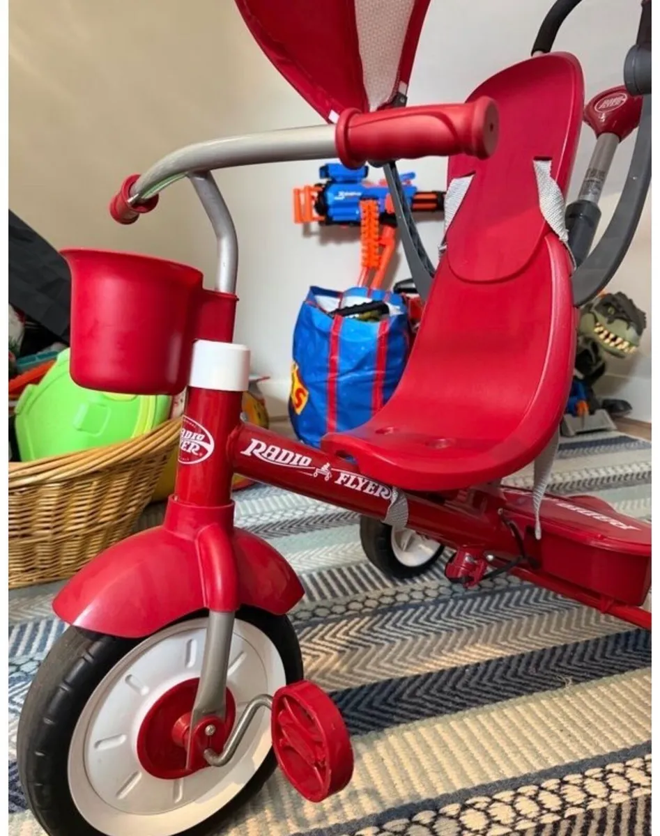 Radio Flyer 4-in-1 grow-with-me stroller tricycle - Image 1