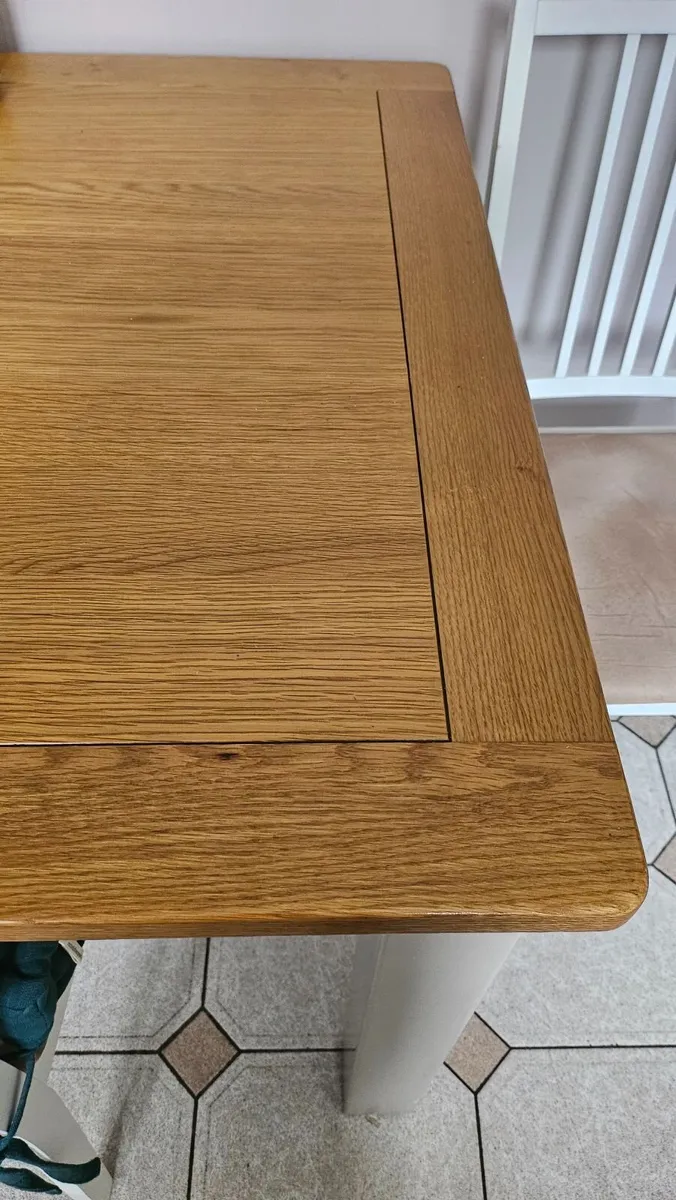 Wood Dining table and padded chairs - Image 3