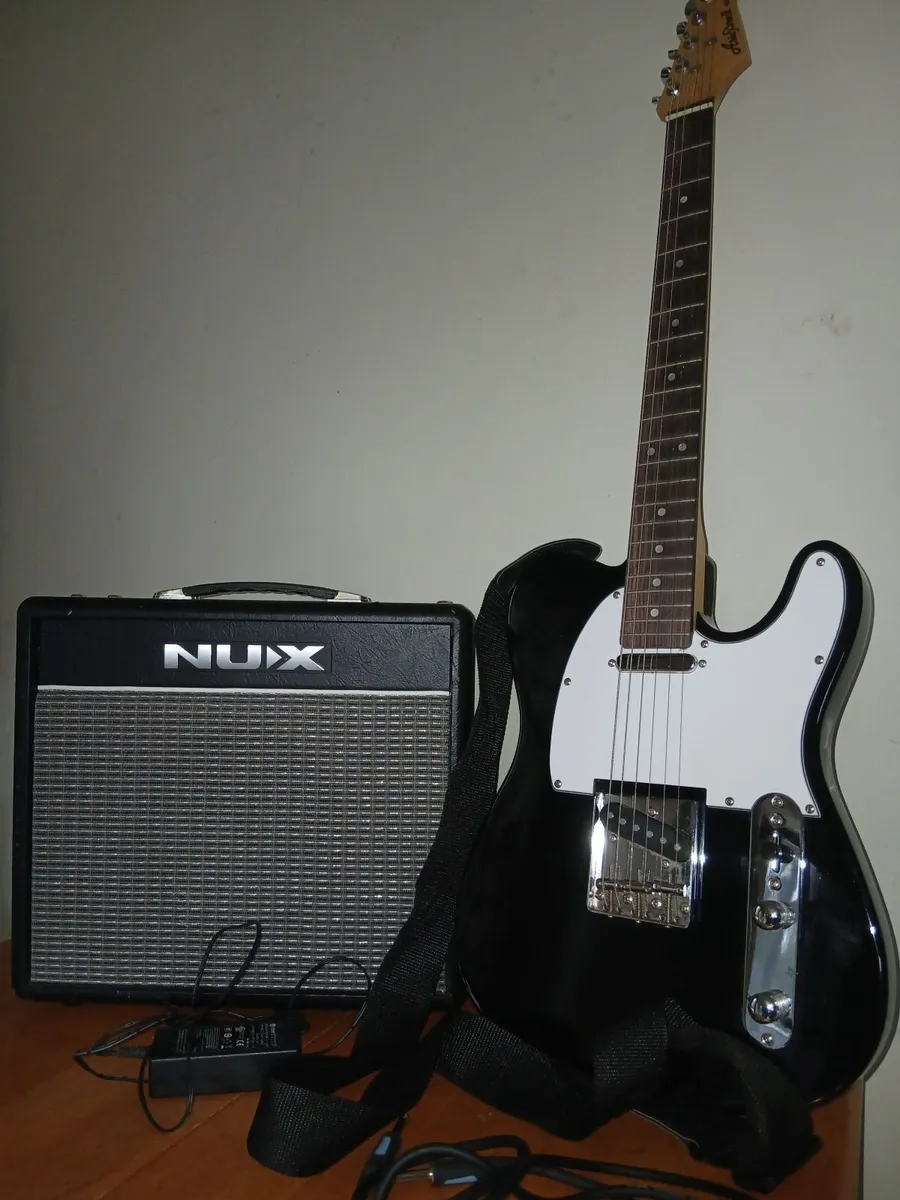 Aria Electric guitar and Nux amp