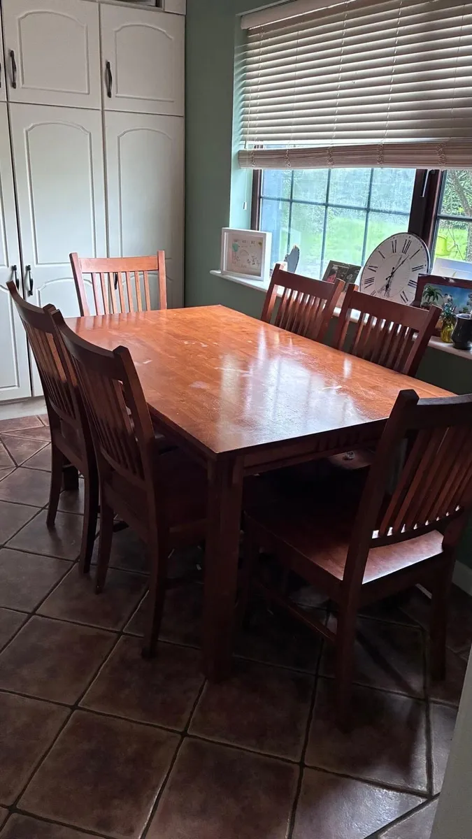 Dining table and six chairs - Image 1