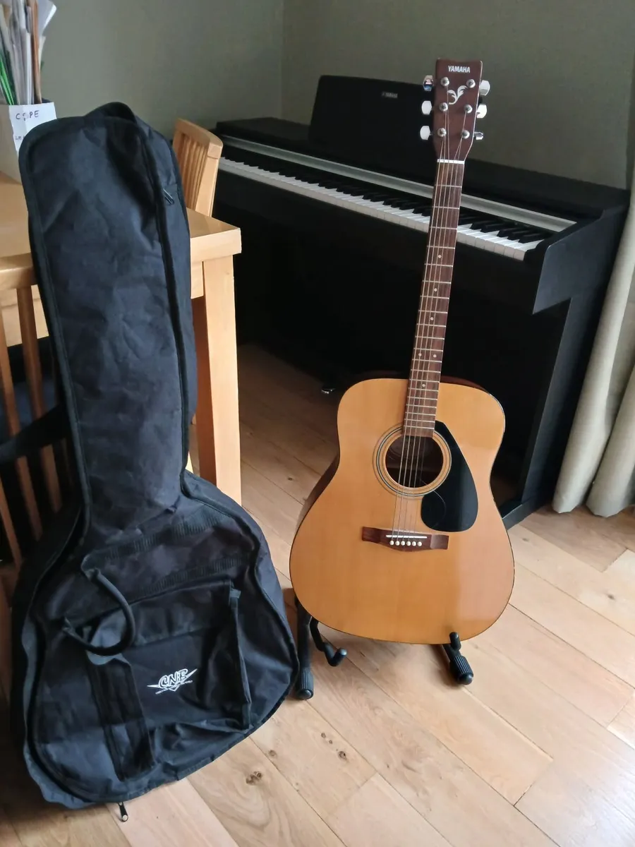 Yamaha Guitar with stand and cover - Image 1