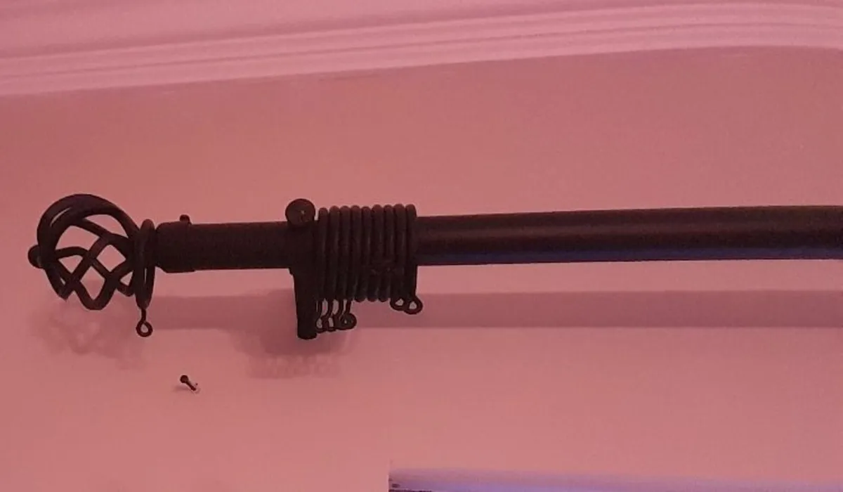 Black curtain pole with tie back hooks
