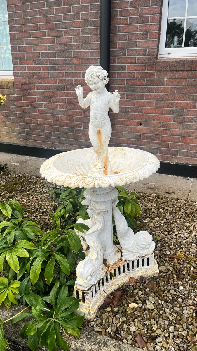 Ornate cast iron bird bath