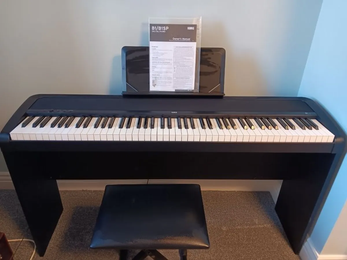 Korg electric piano . Comes with original piano stool..