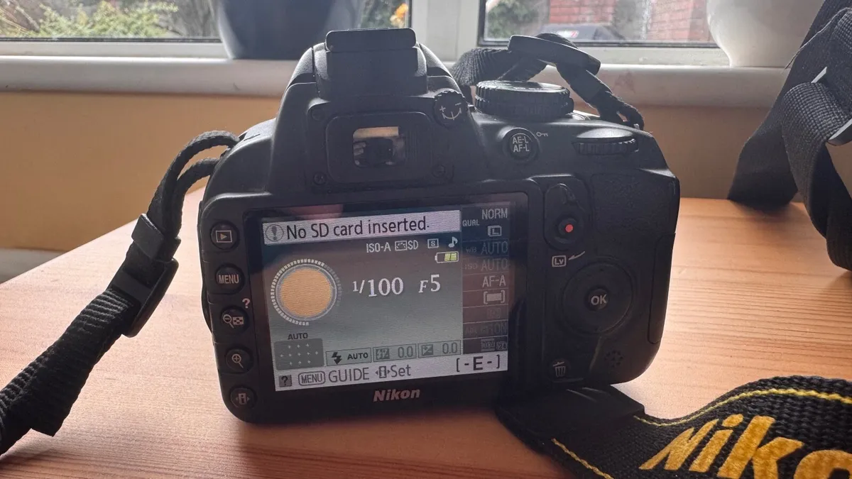 Nikon D3100 DSLR w/ 18-55mm VR Lens + Accessories - Image 1