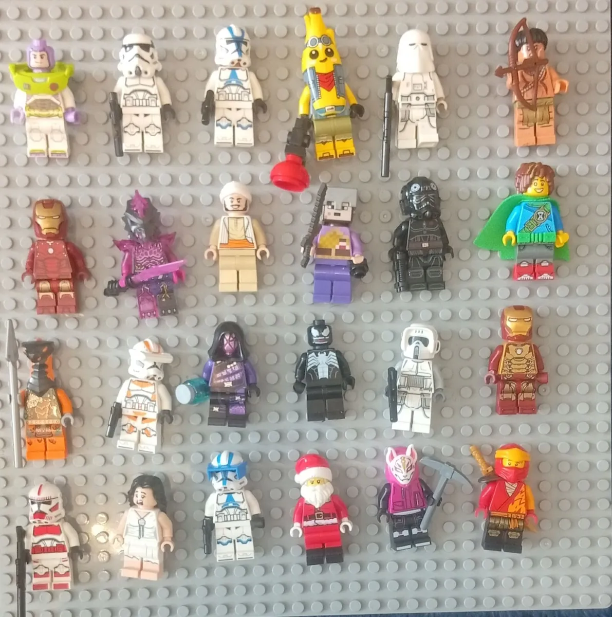 120 Lego mini figures plus a boxes of spare parts - Image 1