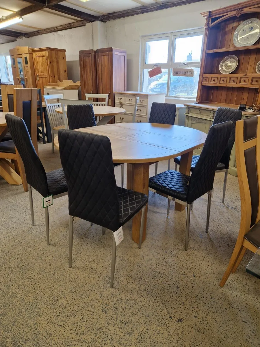 6 ex display leather chairs extendable oak table - Image 3