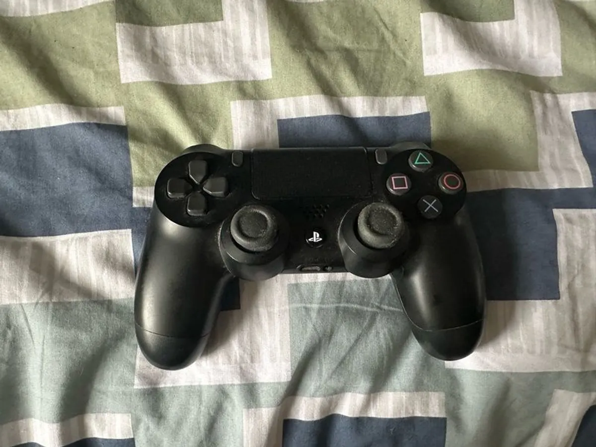PlayStation 4 Pro 1TB SSD with games, cables and controller - Image 2
