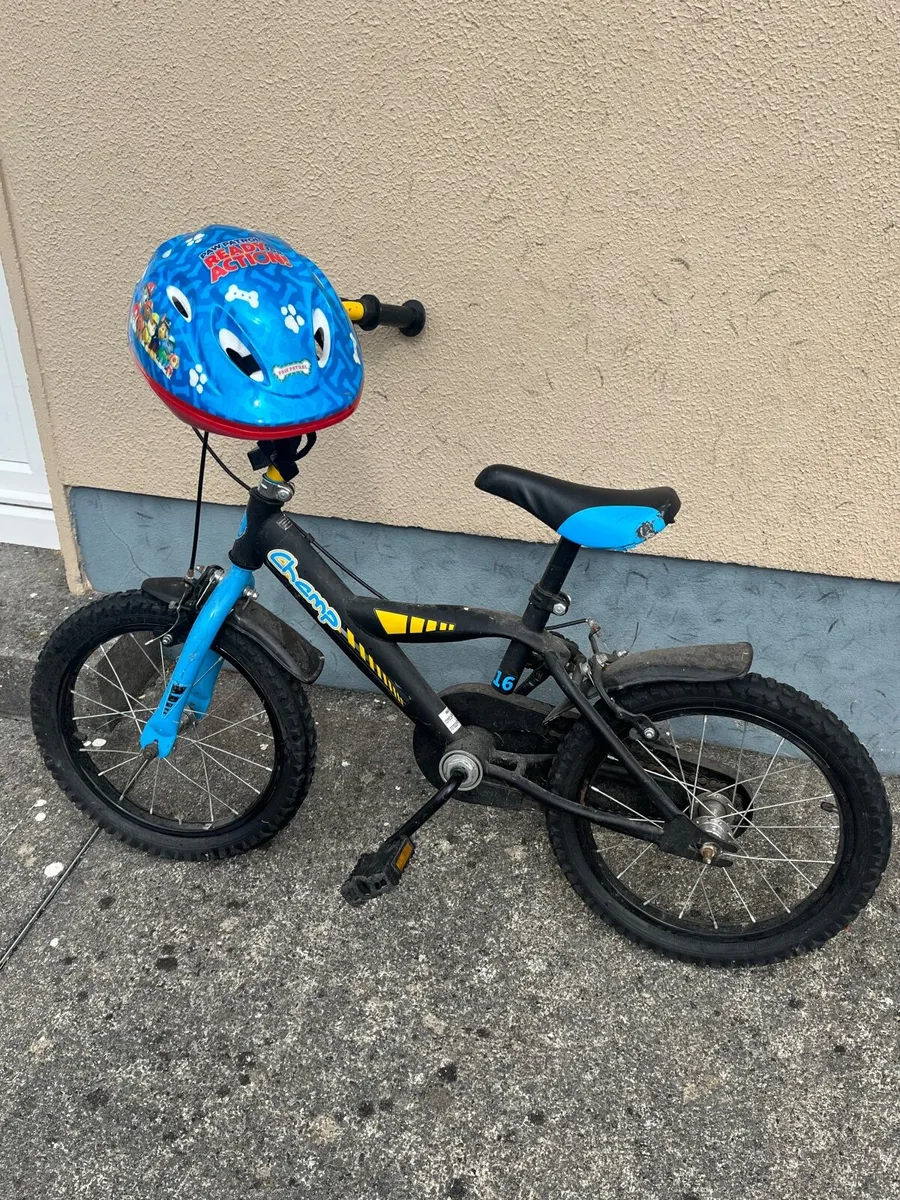 Boys bicycle and helmet