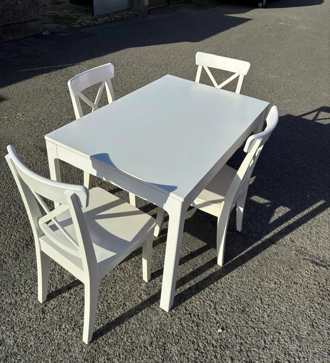White extending Table and 4 Chairs - Image 1