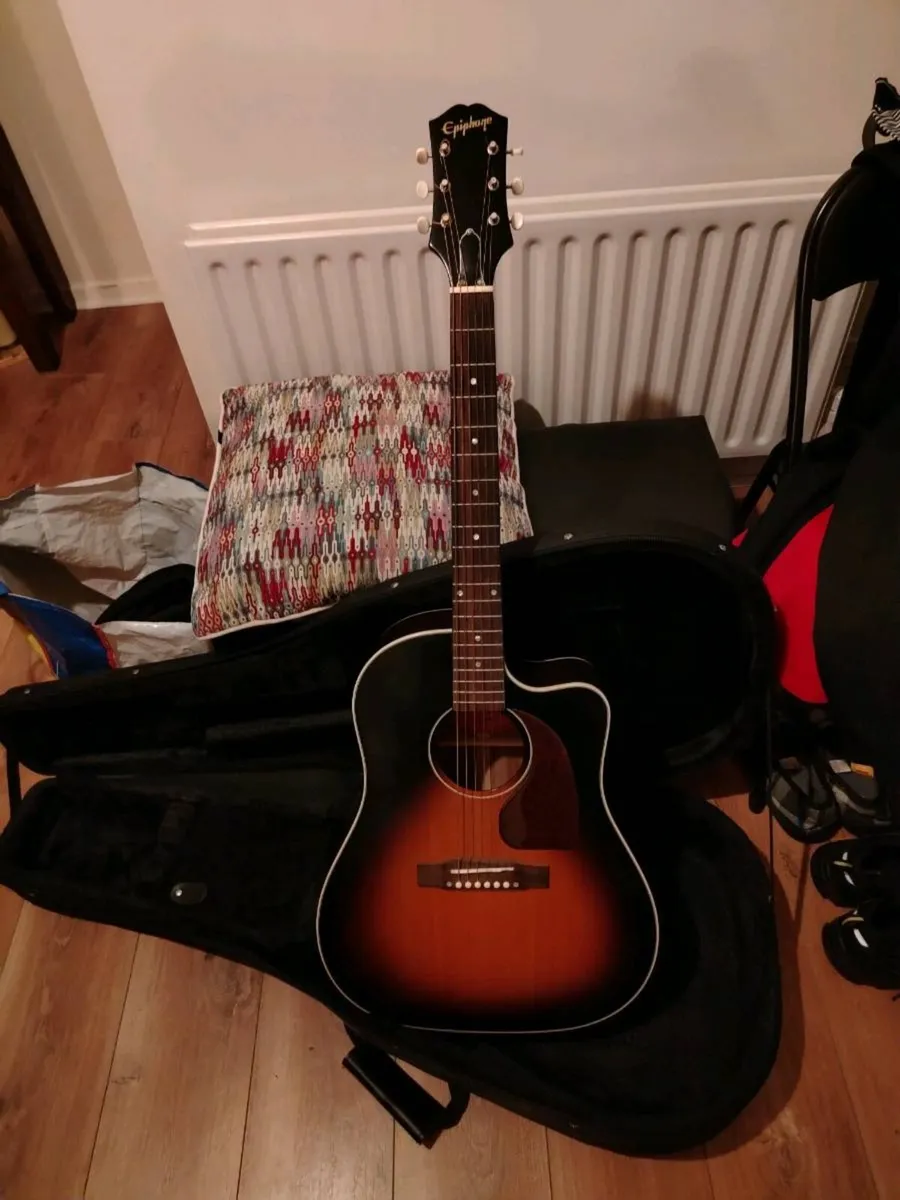 Acoustic Guitar - Image 1