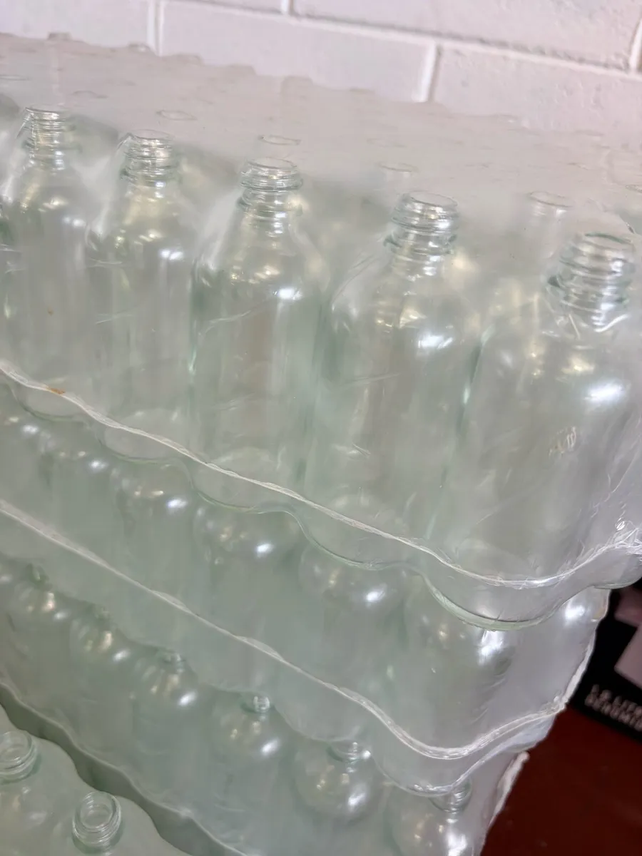 630 New 50 ml Glass Bottles with Screw Caps - Image 1