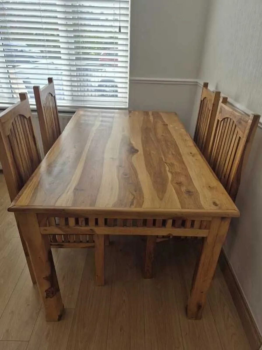 Hardwood dining table and accessories - Image 1