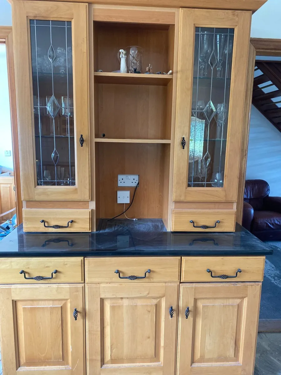 Kitchen cabinet  with black granite worktops