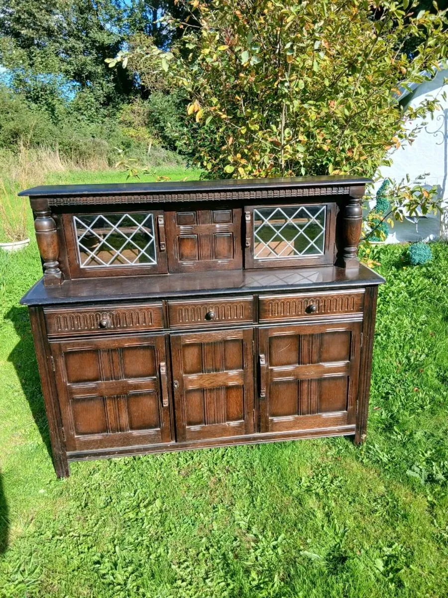 Vintage Tudor Style Dark Oak Dresser - Image 1