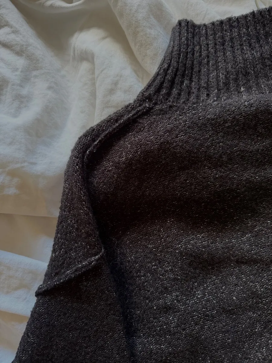 Black Shimmer Ribbed Turtleneck Sweater - Image 1