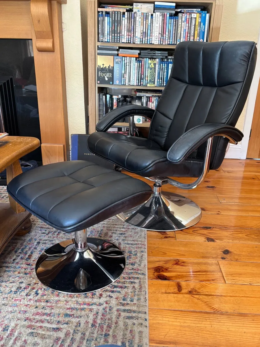 Black swivel chair and matching footstool