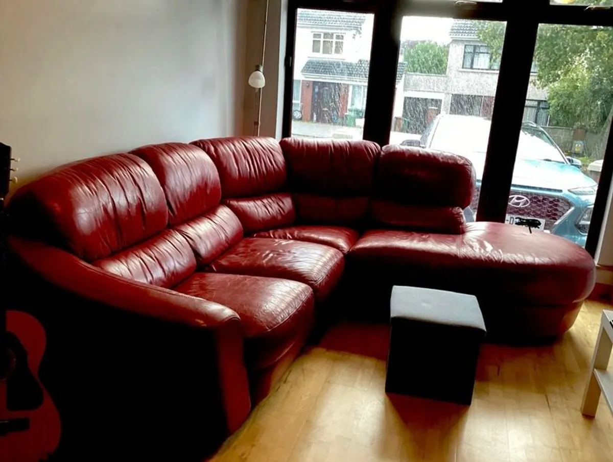 Red leather corner sofa