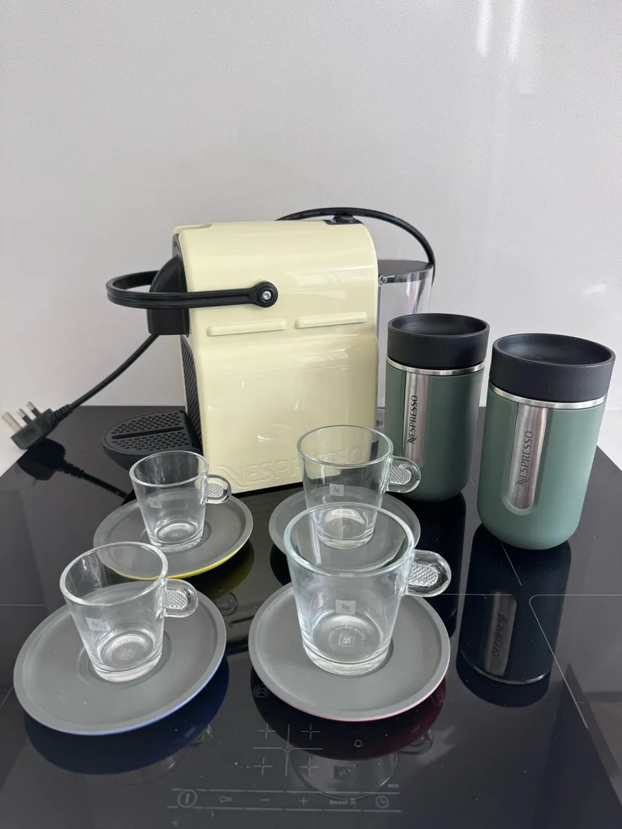 Nespresso machine with travel mugs
