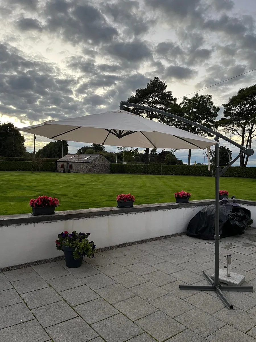 Large parasol umbrella with stand