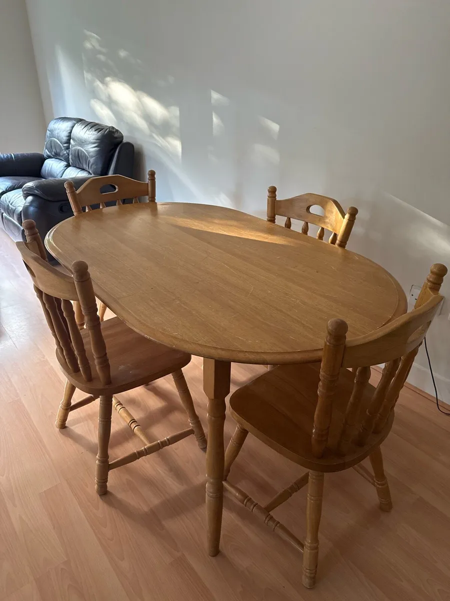 Sturdy wooden dining table and four chairs set - Image 1