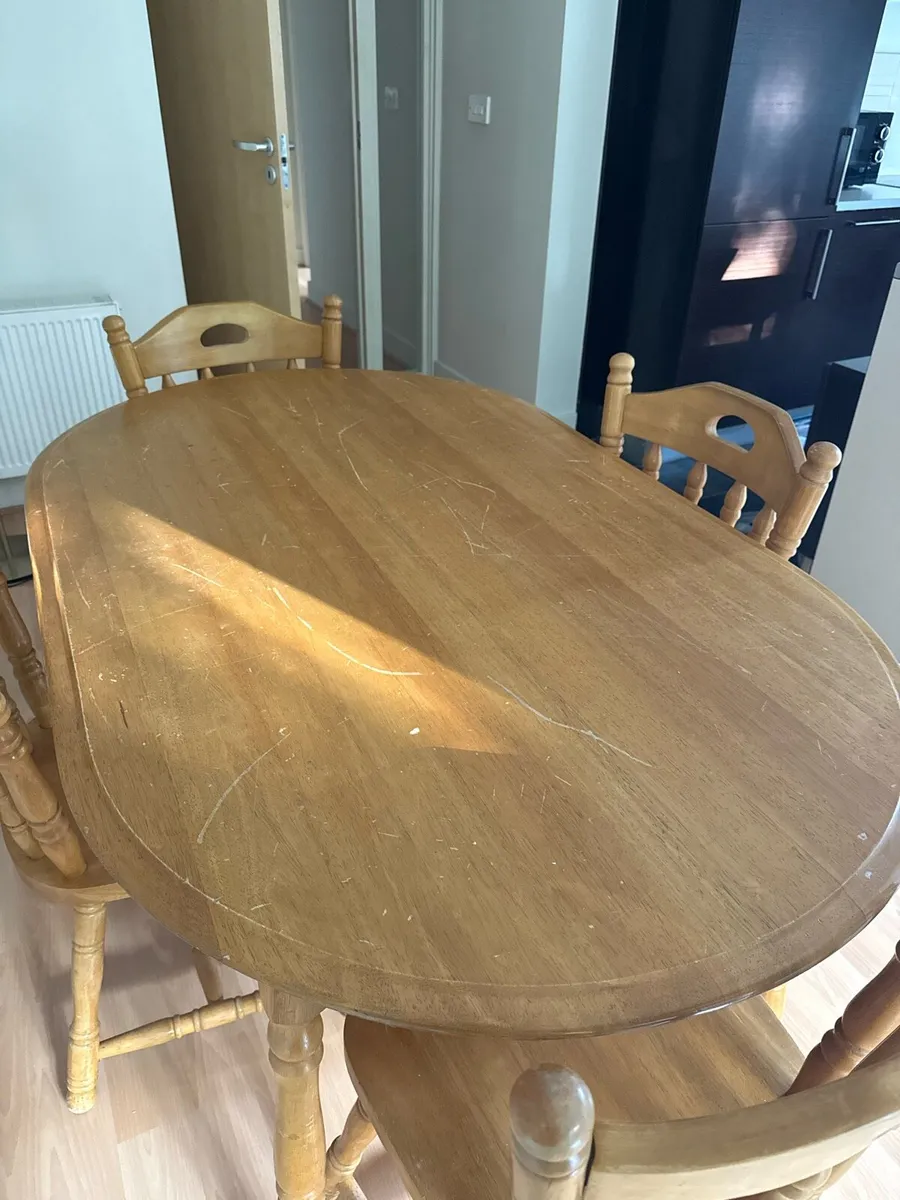 Sturdy wooden dining table and four chairs set - Image 4