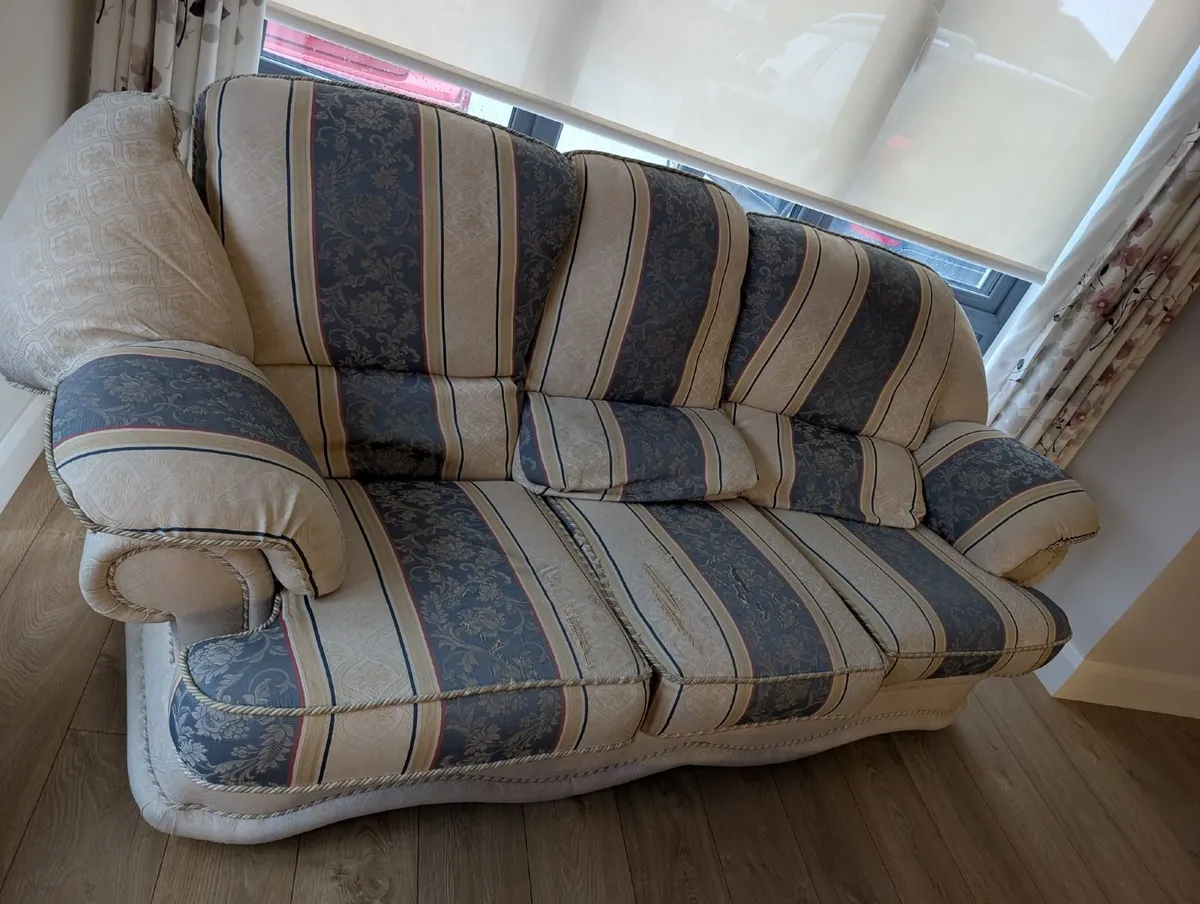 Beige 3 seater sofa