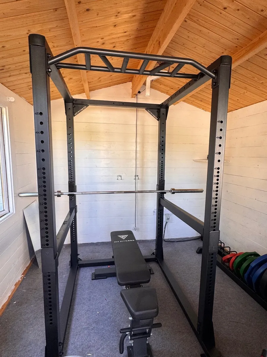 Squat rack and weights - Image 1