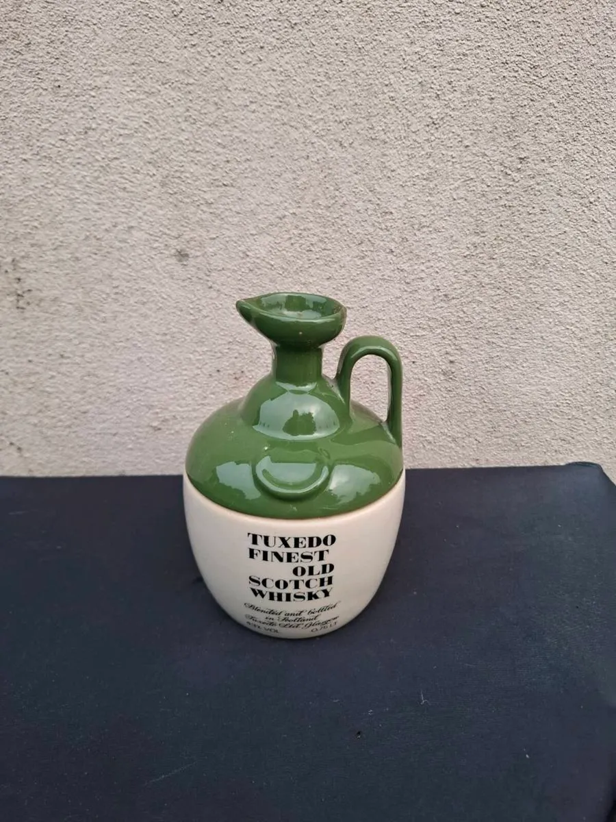 Tuxedo whiskey bottle postage possible