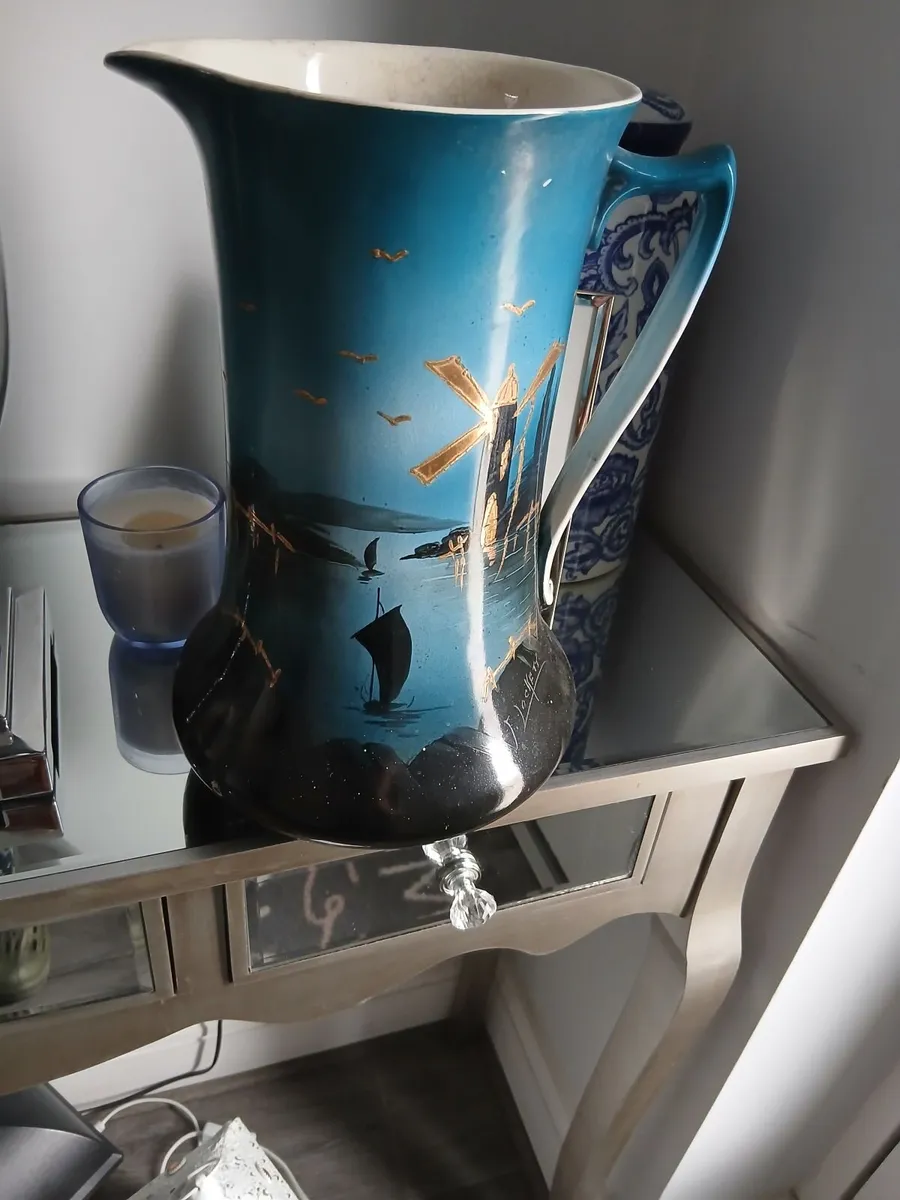 A lovely old jug for sale it would look.lovely