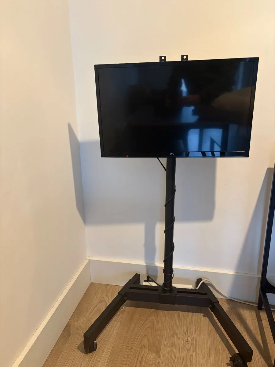 JVC TV with Mobile Heavy-Duty Rolling Floor Stand - Image 2