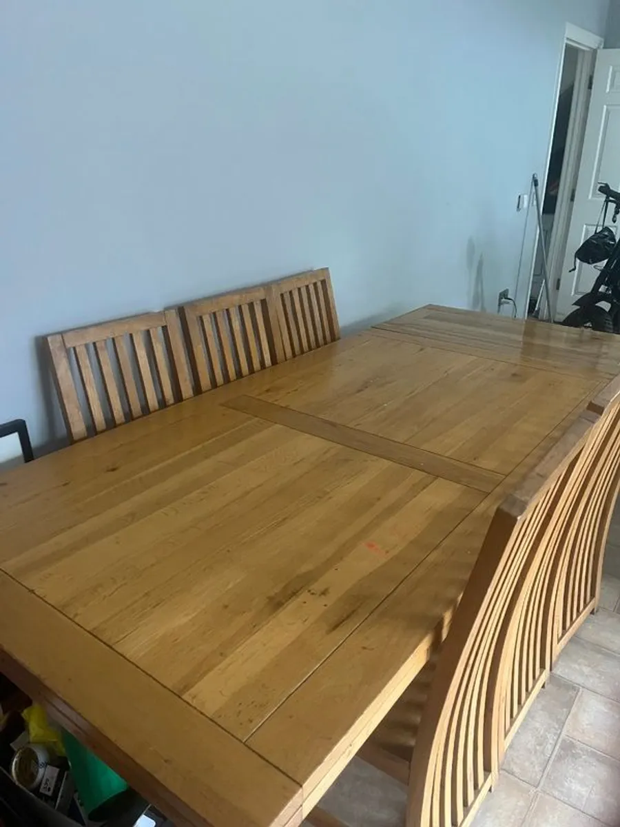Solid Oak extending dining table and chairs - Image 1