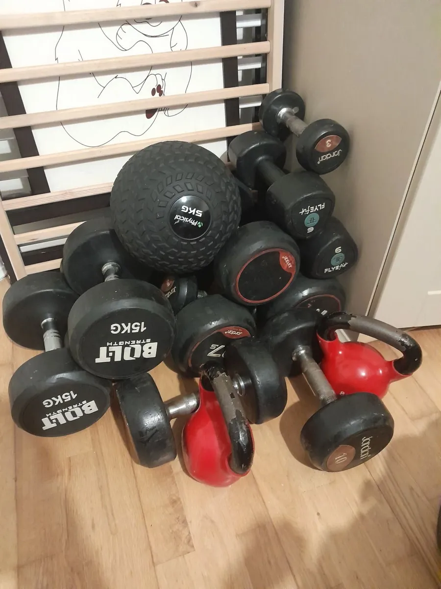 Used dumbbells, kettlebells and slam ball