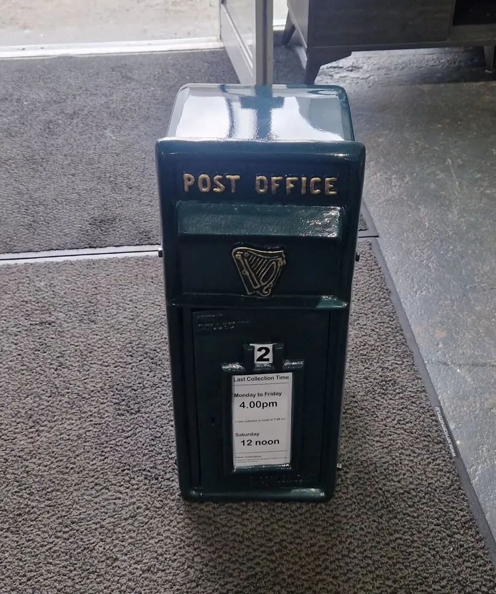 New cast iron green post box