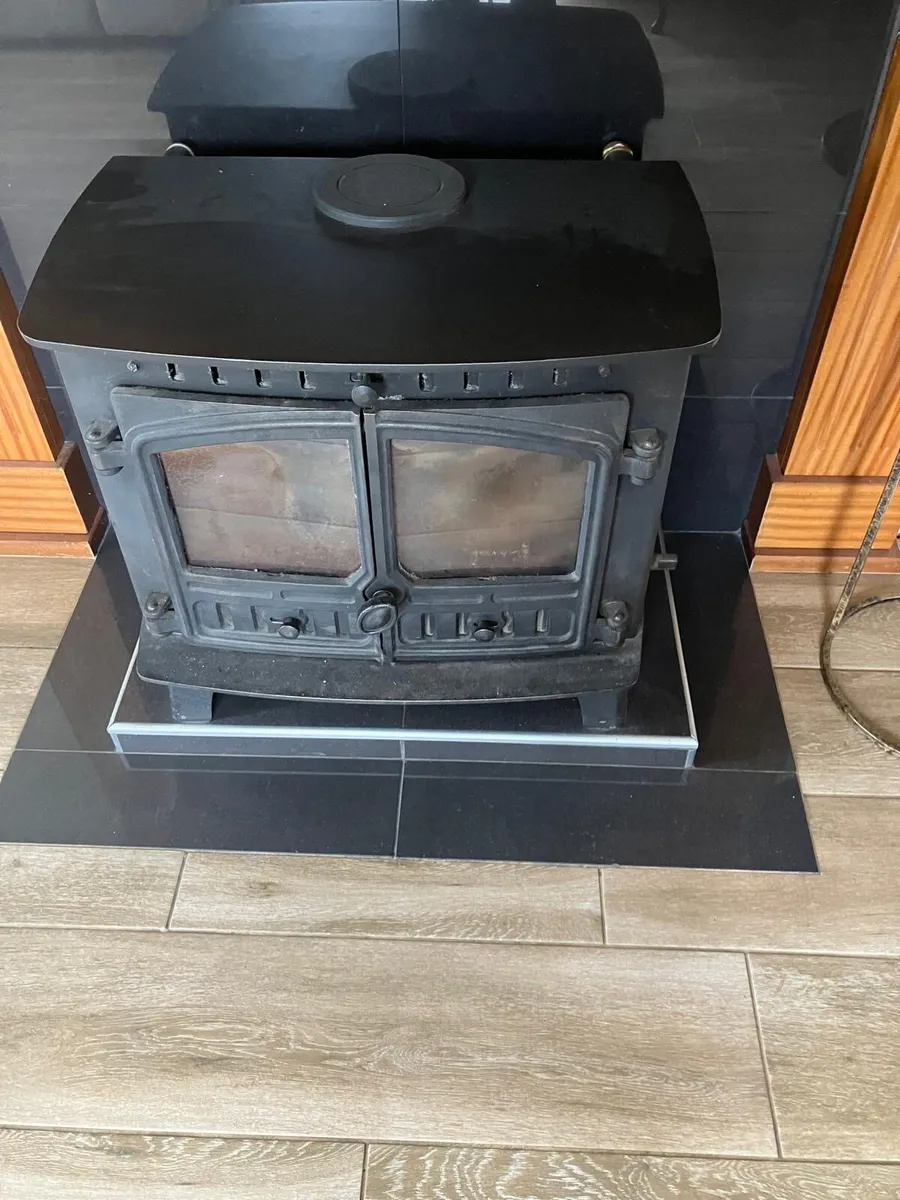 Black hunter stove with back boiler