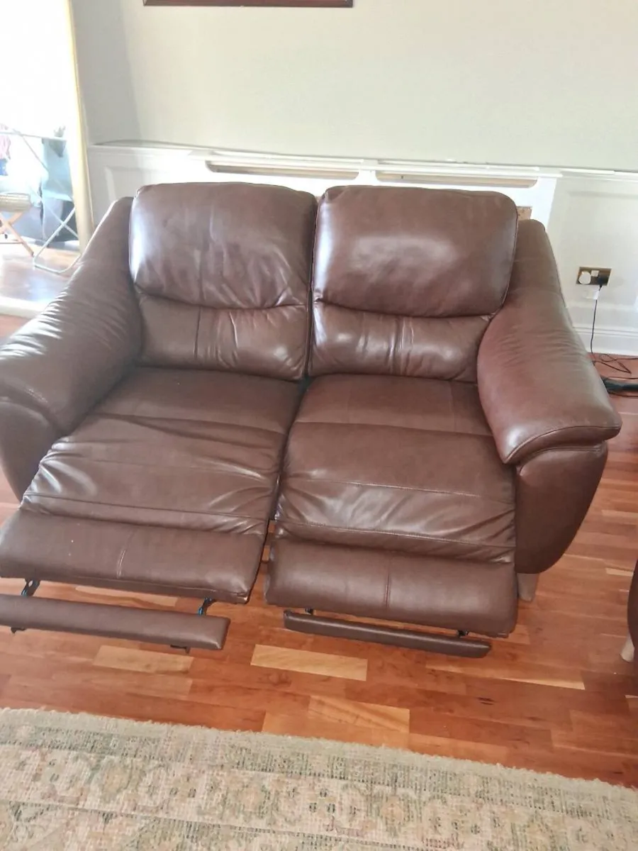 Two 2 seater leather sofas electric recliners as n - Image 2