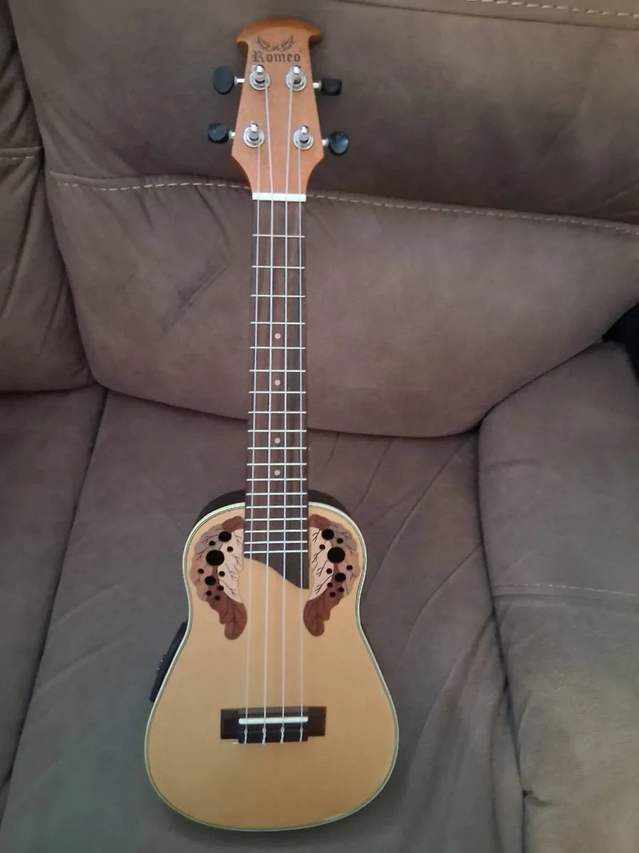 Electro acoustic ukulele. - Image 1