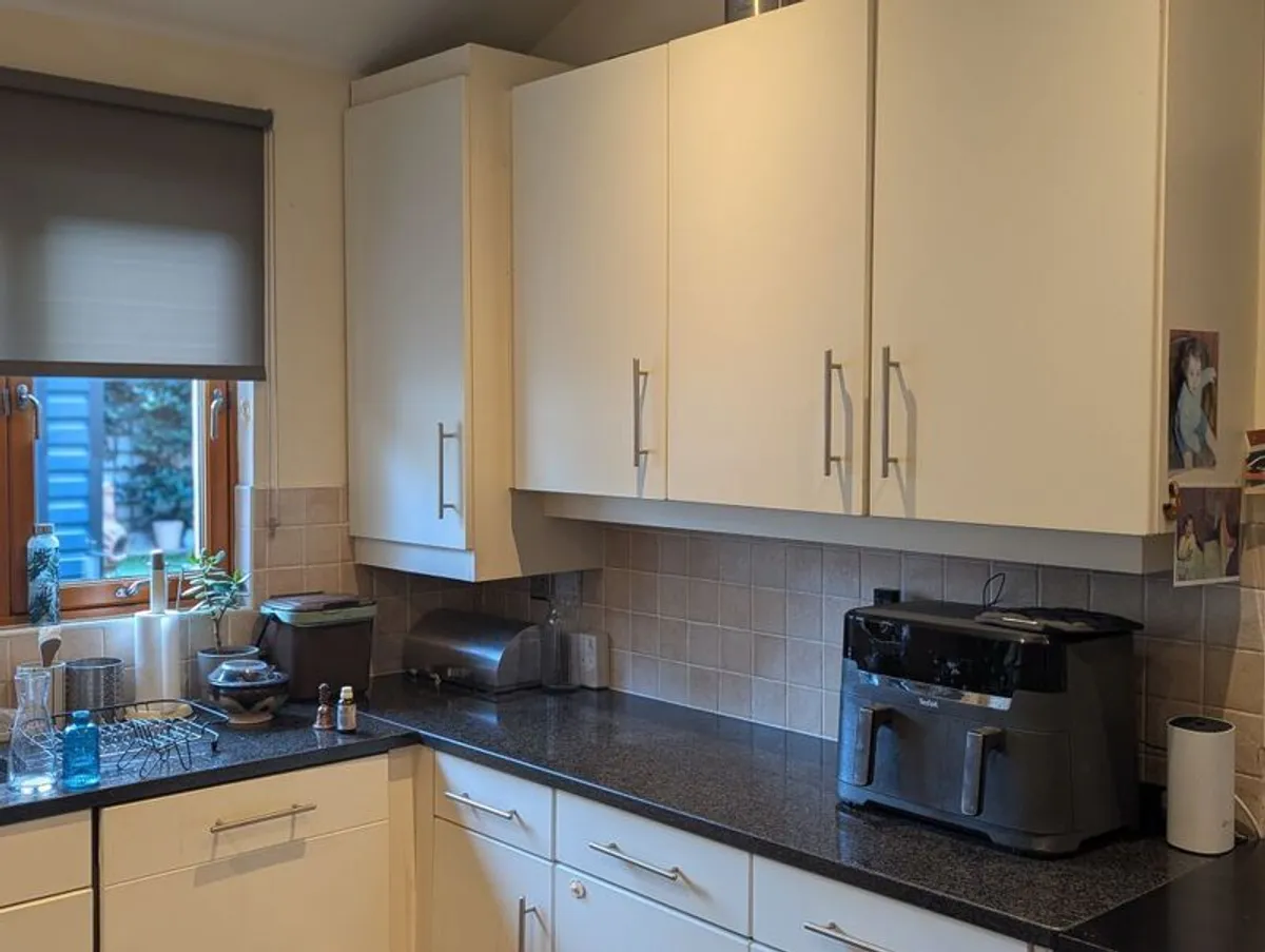 Kitchen with black granite worktop - Image 2