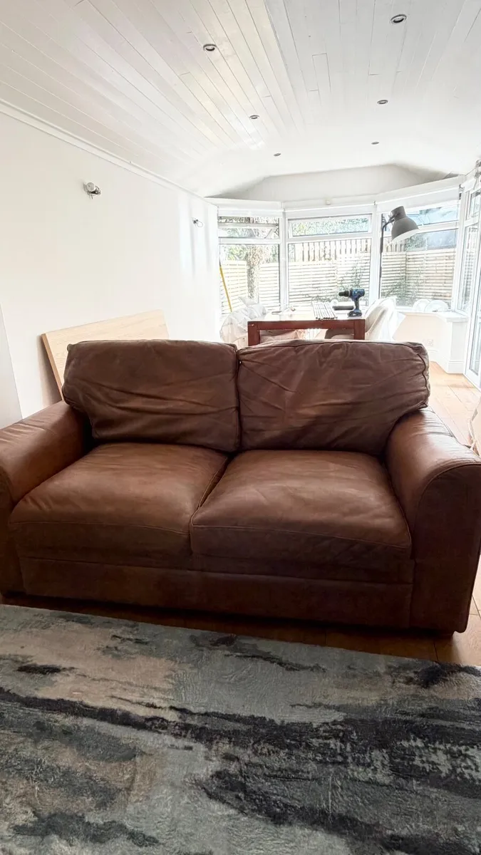 Free 2 seater brown leather couch - Image 1