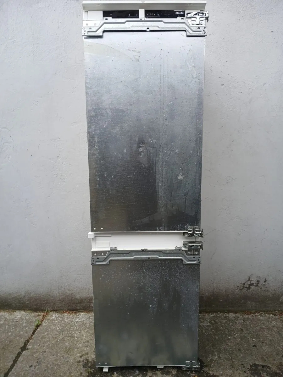 70/30 EX DISPLAY BRAND NEW INTEGRETED FRIDGE AND F - Image 1