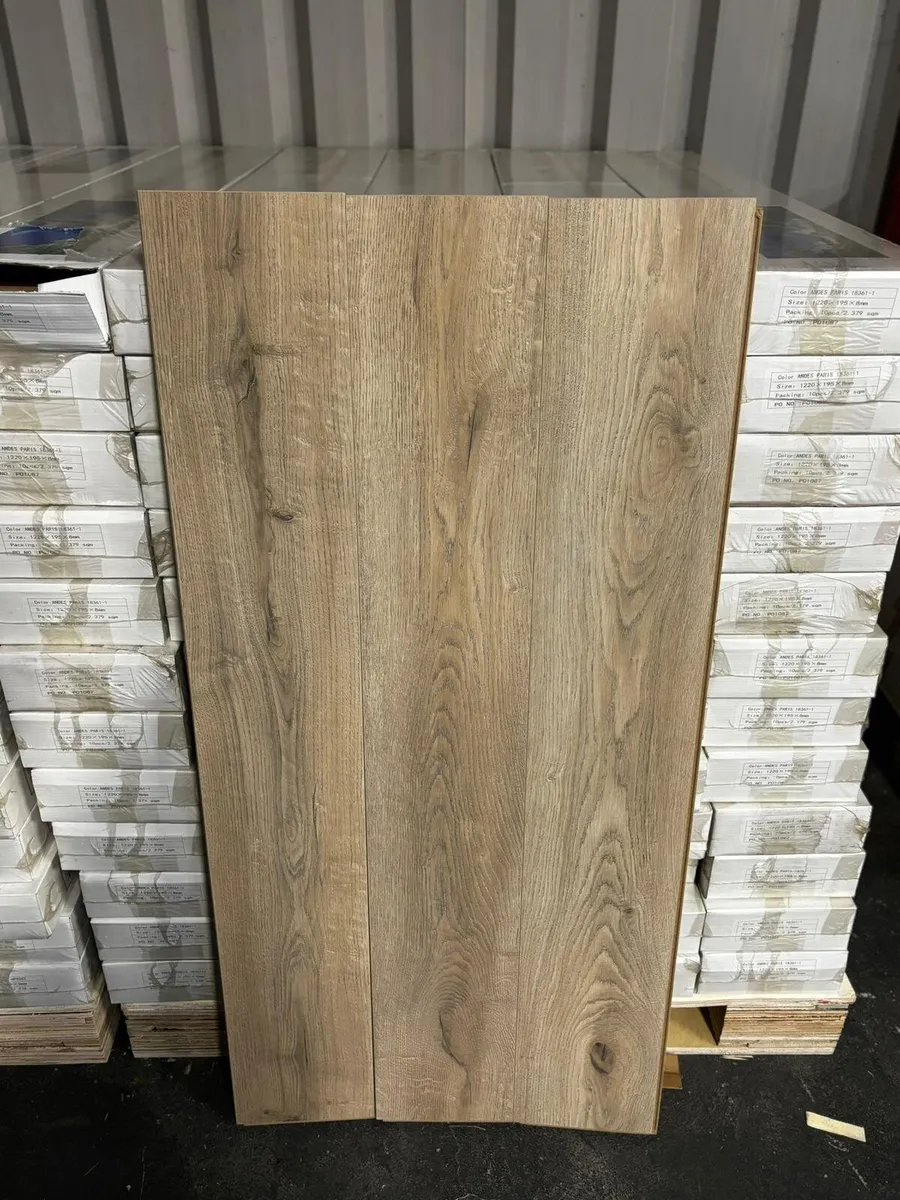 New Paris 8mm Laminated Flooring Free Delivery - Image 1