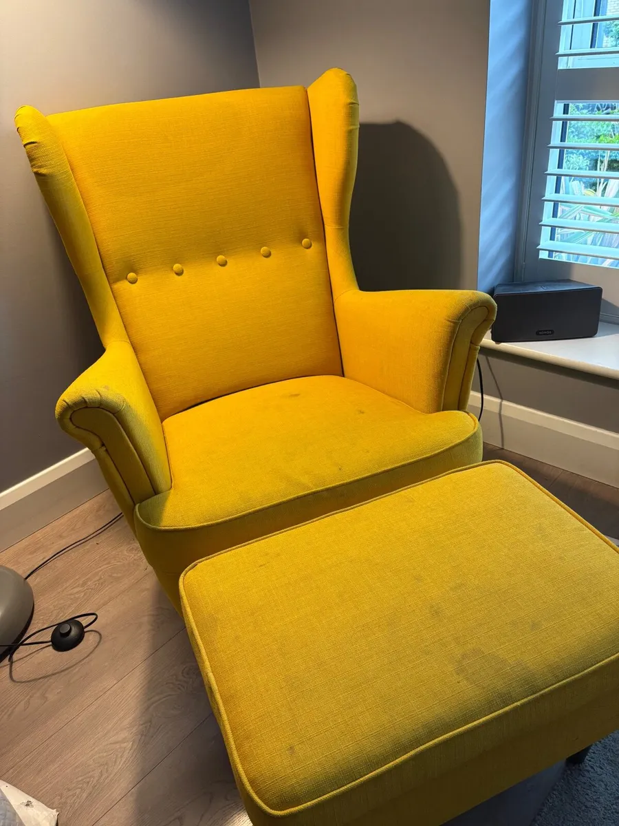 Two Ikea Strandmon arm chairs and foot stools - Image 1