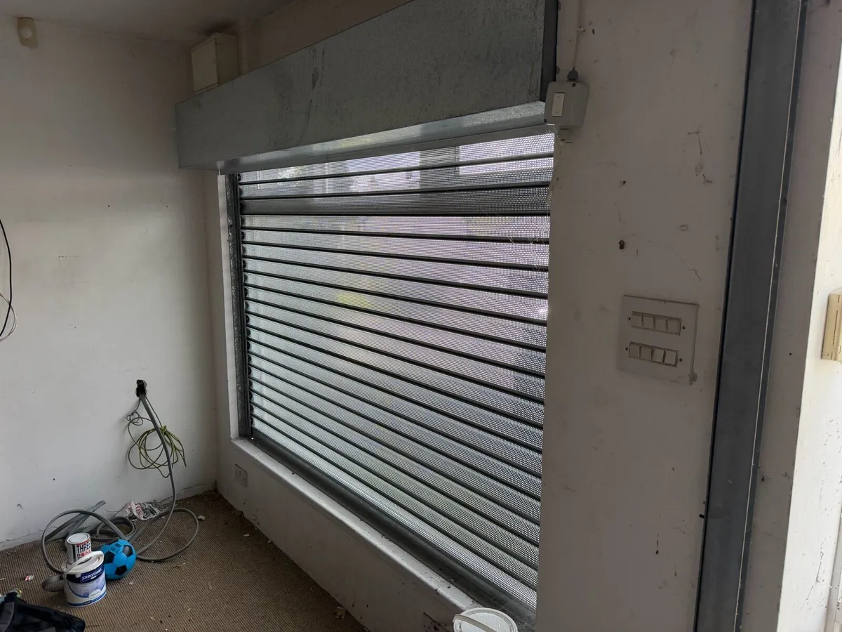Shop windows and door shutters - Image 1